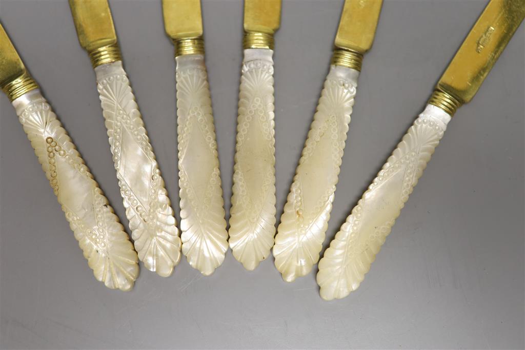 A set of six late 19th century Russian carved mother of pearl handled gilt 84 zolotnik tea knives,